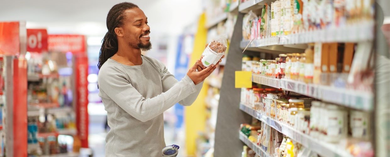 Store Employee helping shopper