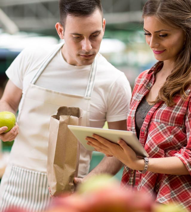 Store Employee helping shopper